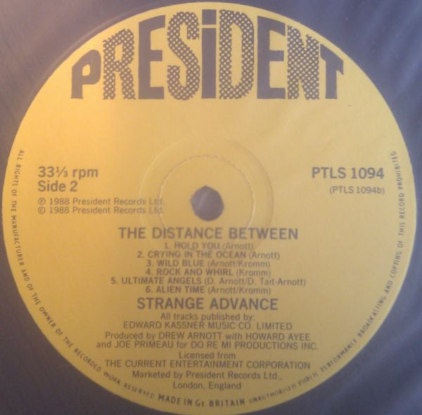 Strange Advance : The Distance Between (LP, Album)
